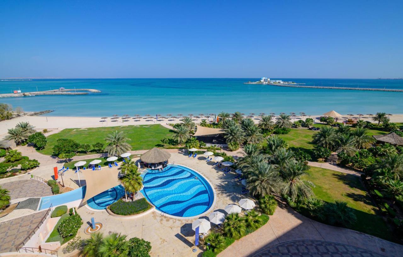 Danat Jebel Dhanna Resort Exterior photo Aerial view of the beach at the Jumeirah Beach Hotel